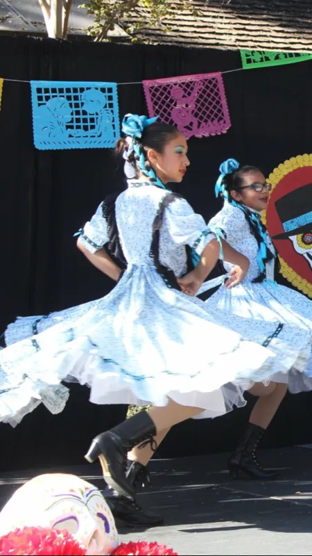 Young folklorico dancer in traditional Mexican attire