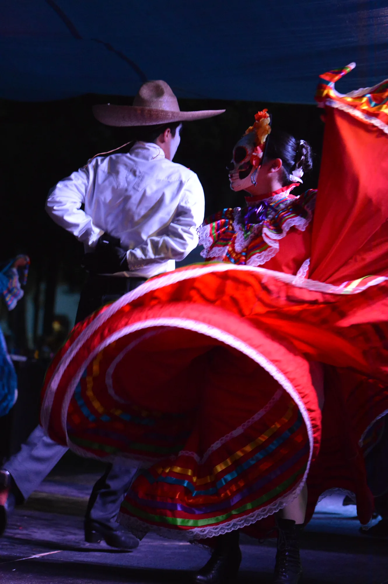 Ballet Folklórico Mi Herencia Jalisco dancer in red dress with partner